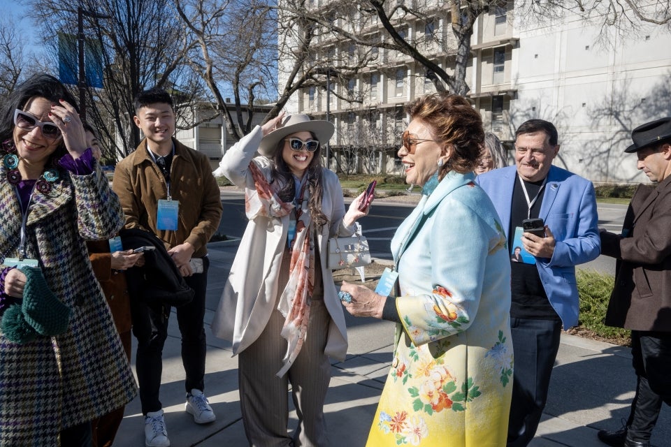 Maria Manetti Shrem greets visitors at the ribbon cutting ceremony on campus.