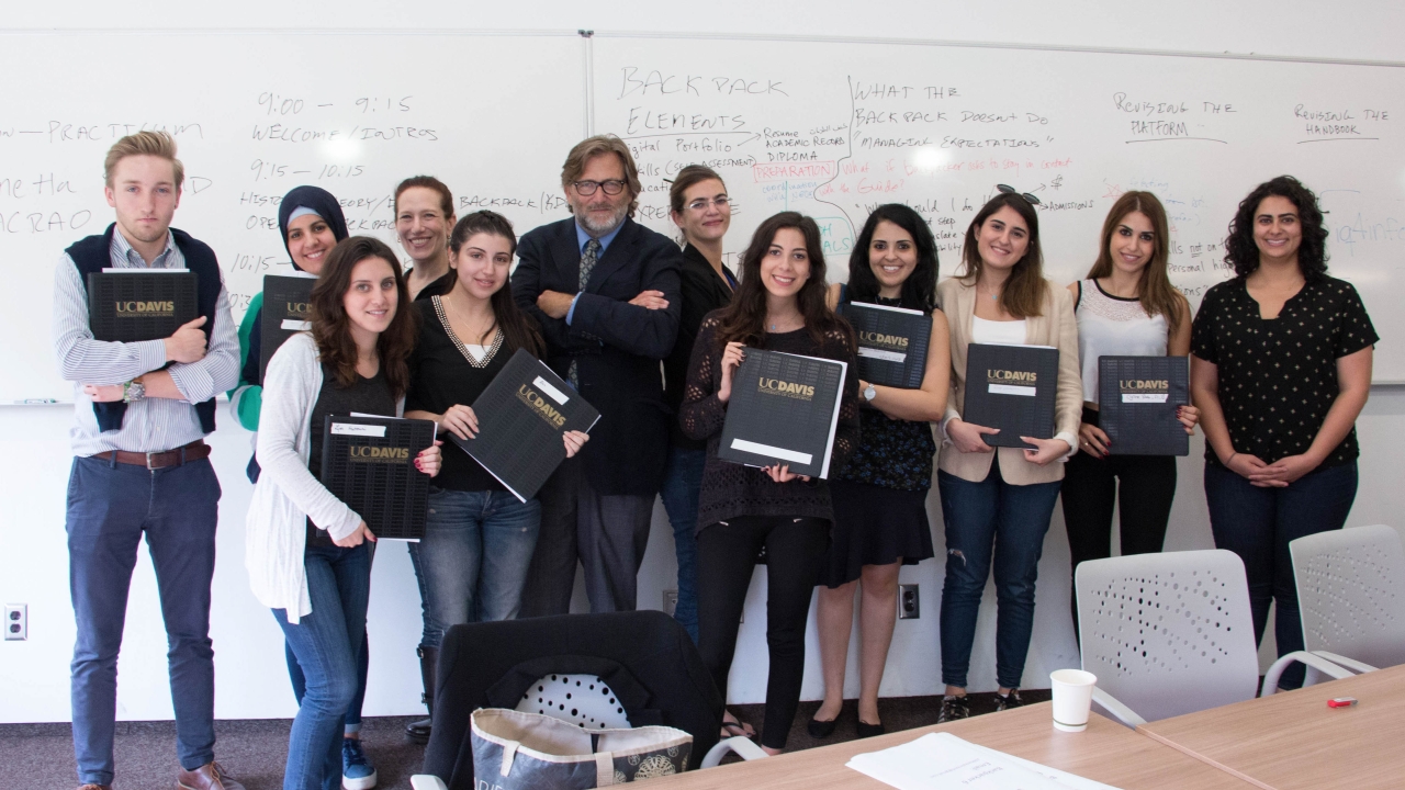 Keith David Watenpaugh, a UC Davis professor, and students UC Davis professor Keith David Watenpaugh with a group of students