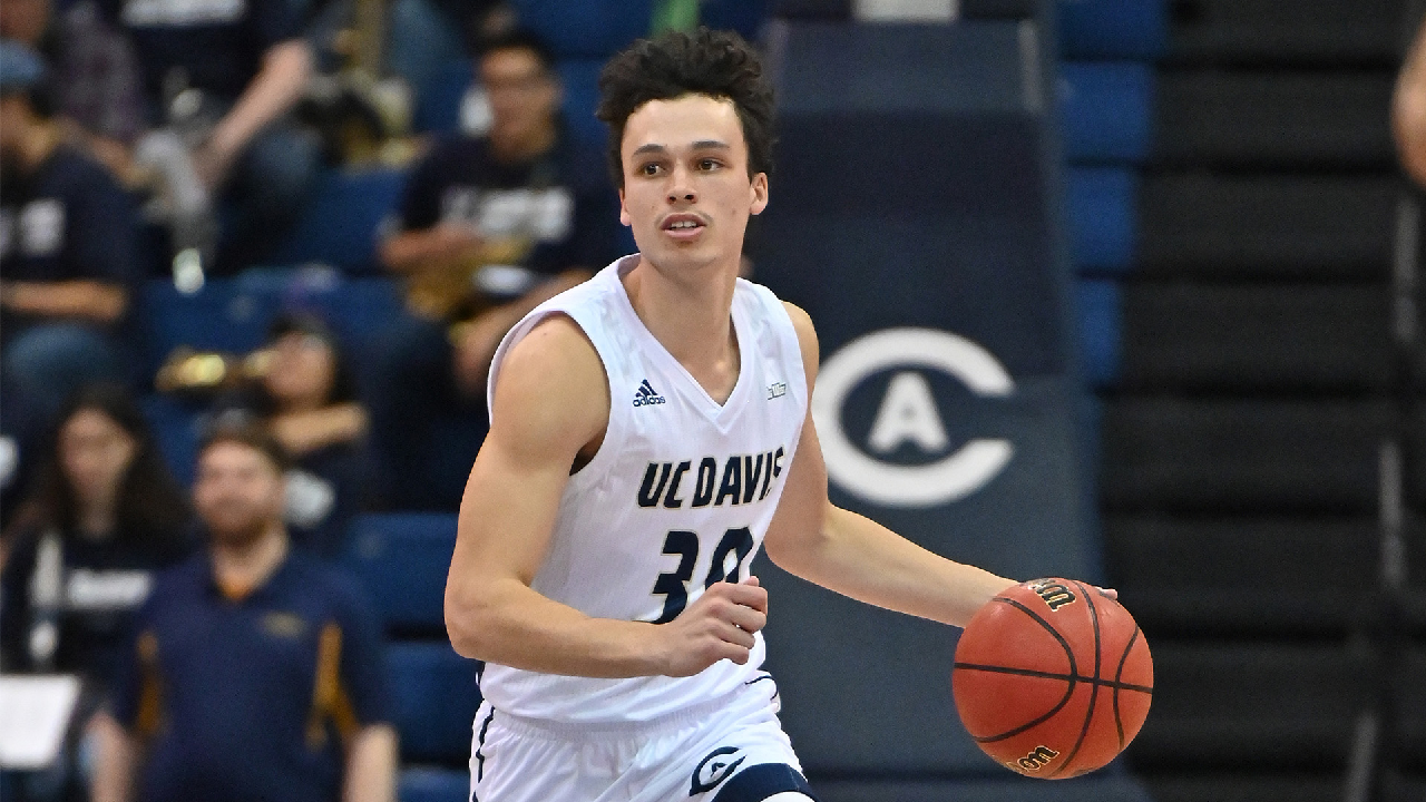 Cameron Ba dribbling a basketball