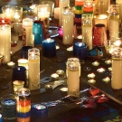 Candlelight vigil image highlights and remembers the victims of violence. 