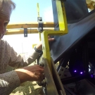 Professor David Slaughter calibrates a smart farm robot