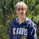 Michelle Nichols smiling wearing her UC Davis sweatshirt